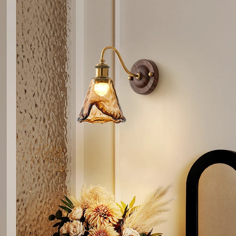 Wall sconce light with scalloped glass shade