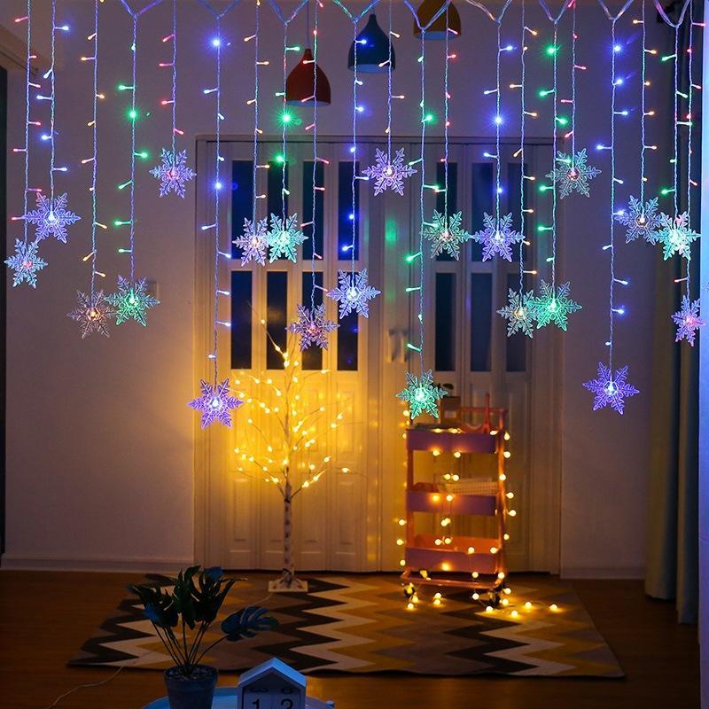LED curtain lights with snowflake design for festive decor - multicolour