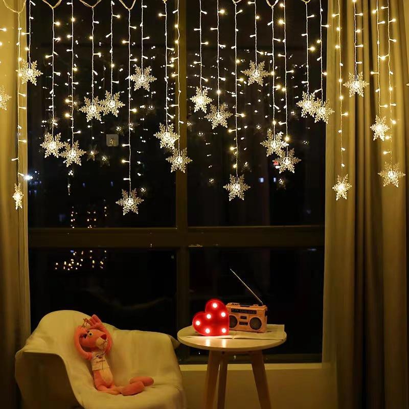 LED curtain lights with snowflake design for festive decor - warm white