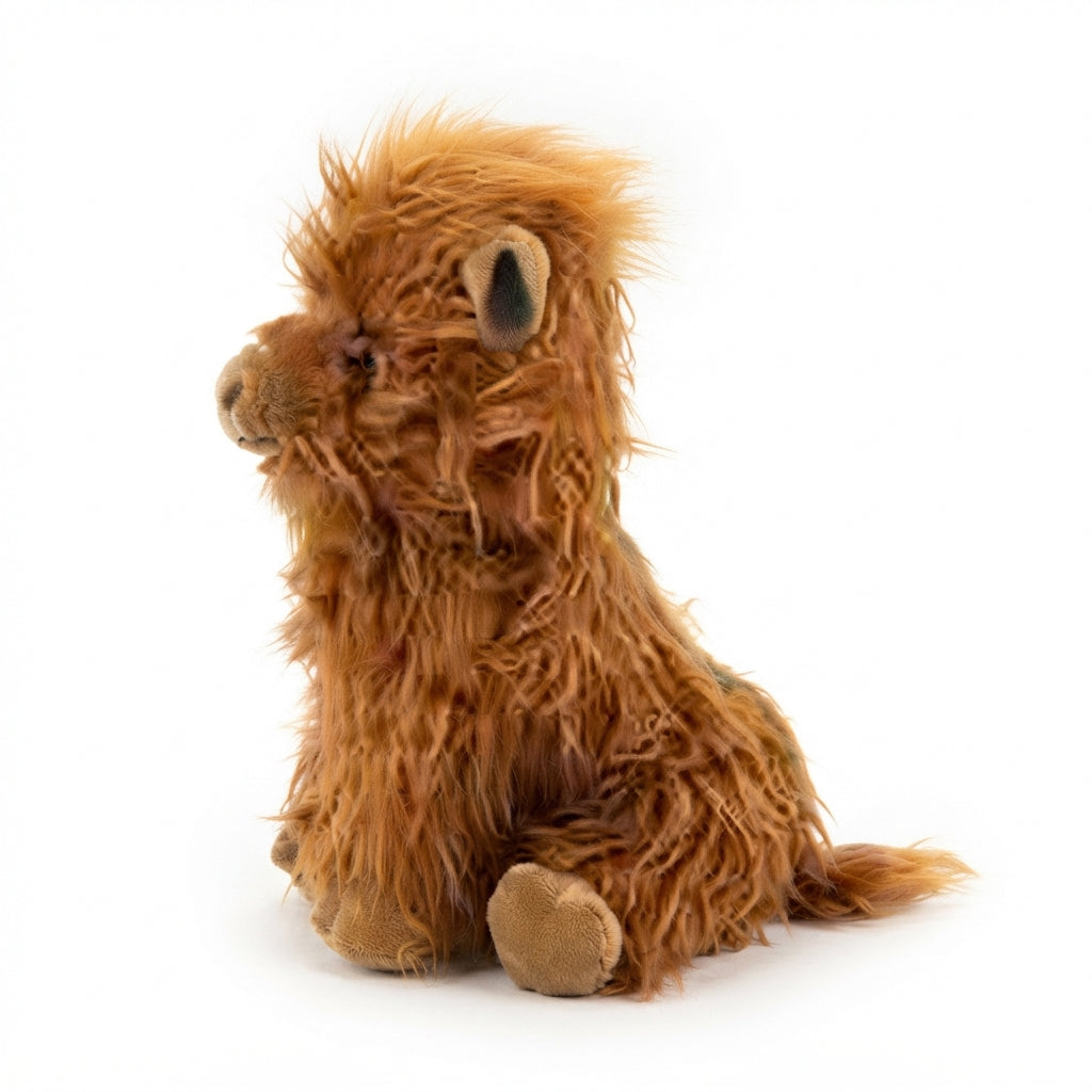 Highland cow plush toy with realistic fur detail