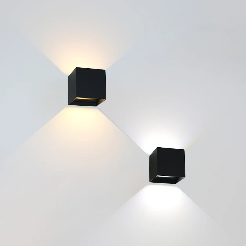 Outdoor wall light with slim vertical housing