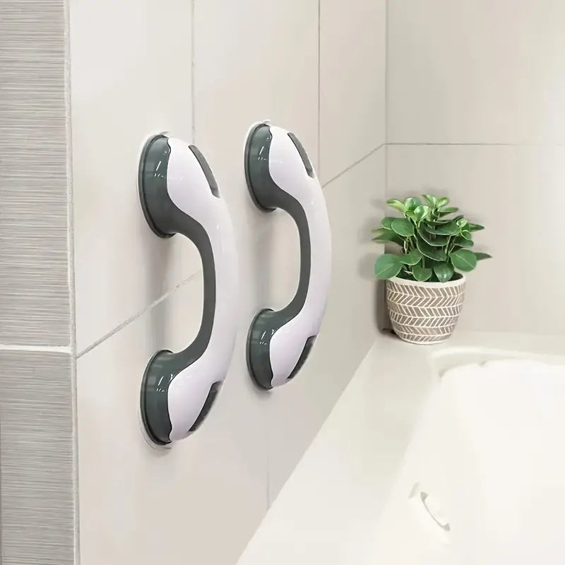 Bathroom safety grab handle with suction cup