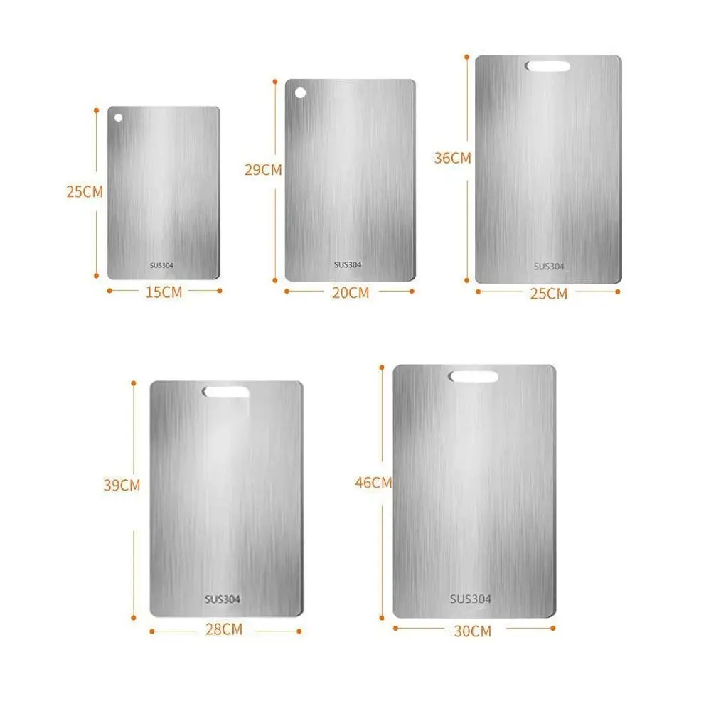 Cutting board with double sided titanium surface