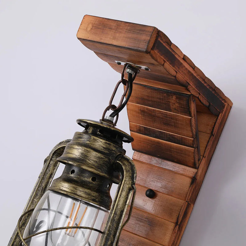 Wall sconce light with rustic lantern design