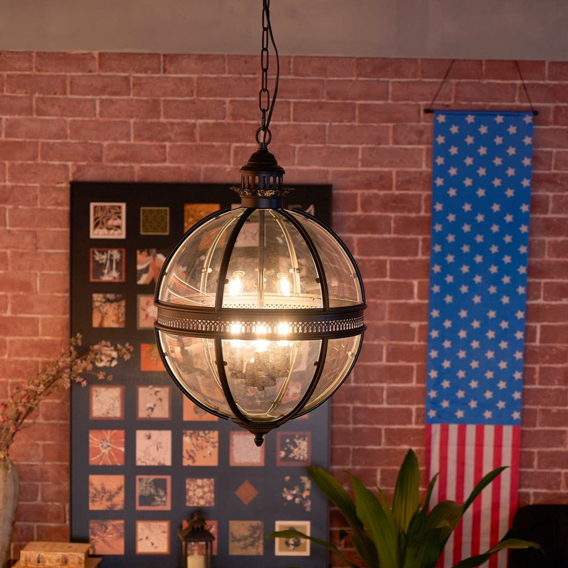 Hanging chandelier light with globe shades