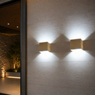 Outdoor wall light with slim vertical housing