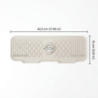 Silicone sink mat with drainage channels around faucet