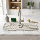 Silicone sink mat with drainage channels around faucet - vanilla cream