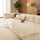 Reversible chenille sofa cover with decorative fringes - elegant cream
