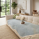 Reversible chenille sofa cover with decorative fringes - misty sky