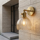 Wall Sconce with Tulip Shaped Glass Shade and Metal Mount - transparent