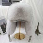 Winter hat with adjustable drawstring - white