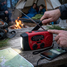 Solar powered emergency radio with SOS alarm and hand crank