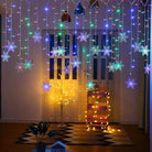 LED curtain lights with snowflake design for festive decor - multicolour