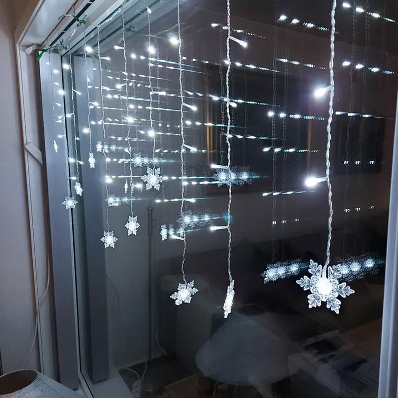 LED curtain lights with snowflake design for festive decor - white