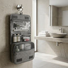Travel toiletry bag with hanging hook and mesh pockets - gray
