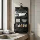 Travel toiletry bag with hanging hook and mesh pockets - black