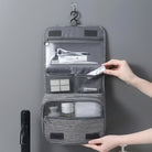 Travel toiletry bag with hanging hook and mesh pockets