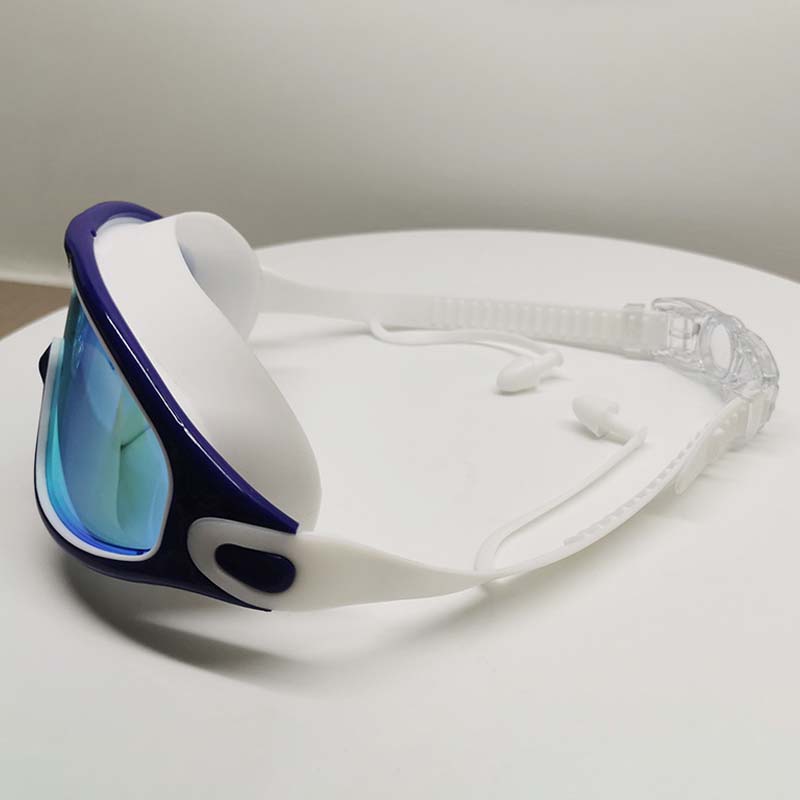 Swim goggles with anti fog coating and silicone strap