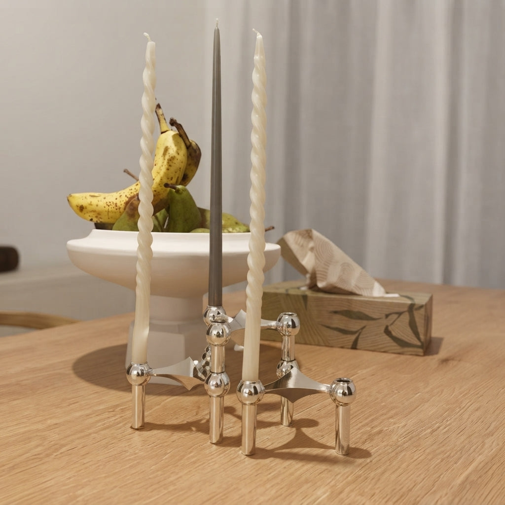 Metal candle holder with modular construction and steel body