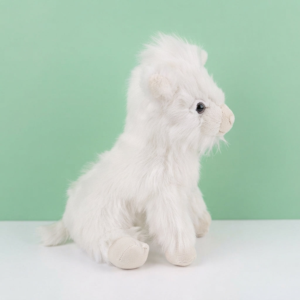 Highland cow plush toy with realistic fur detail