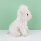 Highland cow plush toy with realistic fur detail