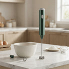 Hand mixer with three speeds and stainless steel whisks - green