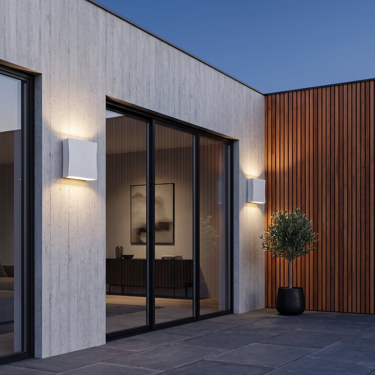 Outdoor wall light with slim vertical housing