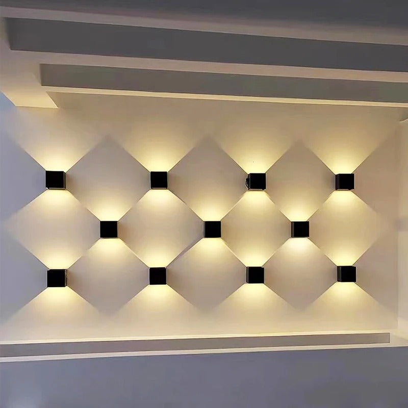Outdoor wall light with slim vertical housing