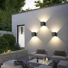 Outdoor wall light with slim vertical housing