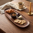 Wooden serving tray with irregular decorative shape