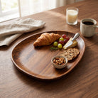 Wooden serving tray with irregular decorative shape