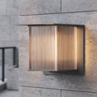 Outdoor wall light with vertical glow design