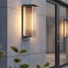 Outdoor wall light with vertical glow design