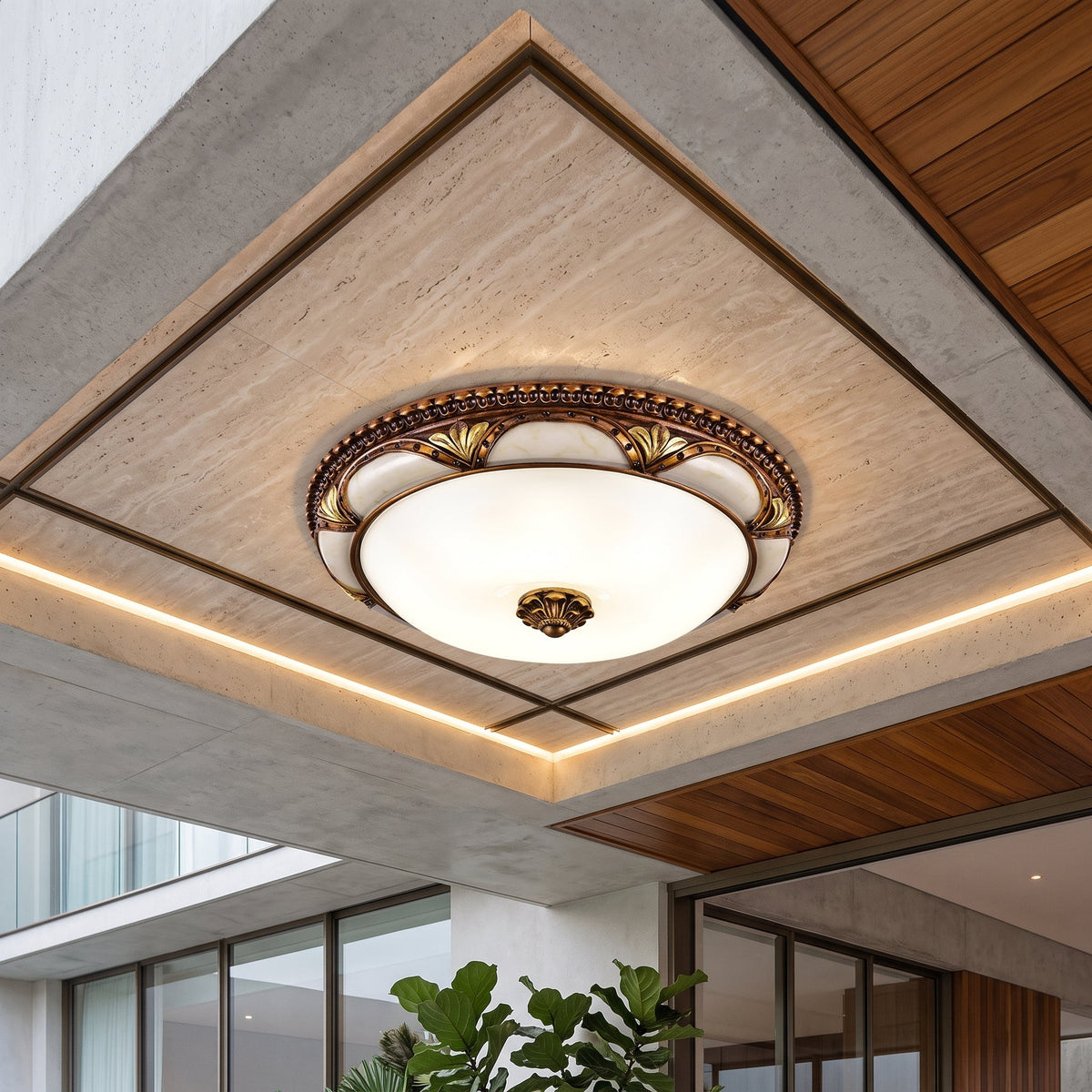 Flush mount ceiling light with round art deco design - brass