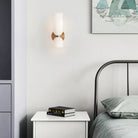 Wall light with frosted glass shade