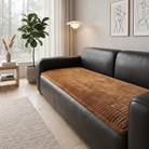Sofa cover with quilted flannel effect design - amber gold