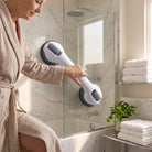 Bathroom safety grab handle with suction cup