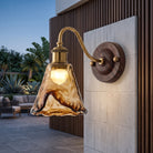 Wall sconce light with scalloped glass shade - amber