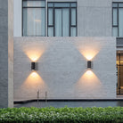 Outdoor wall light fixture with up down lighting