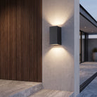Outdoor wall light fixture with up down lighting