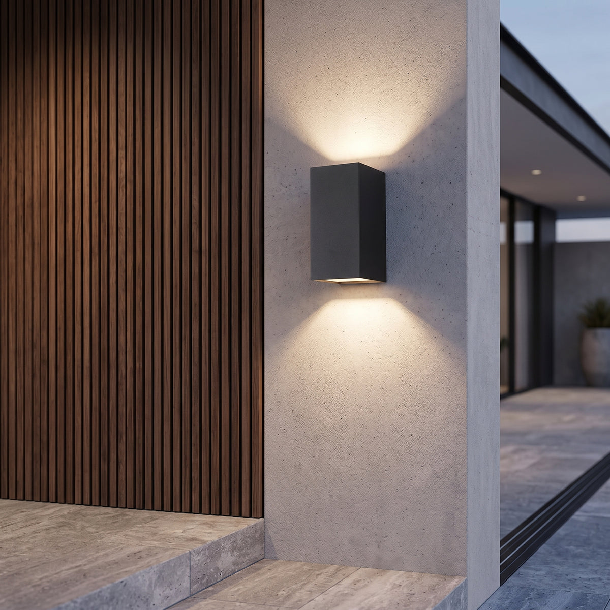 Outdoor wall light fixture with up down lighting
