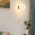 Kids bedroom LED wall light with astronaut moon design