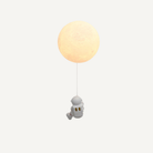 Kids bedroom LED wall light with astronaut moon design