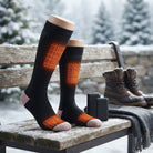 Heated socks with adjustable temperature settings