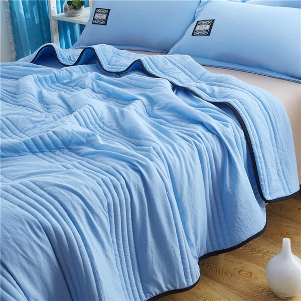 Cooling summer blanket with airy fabric construction