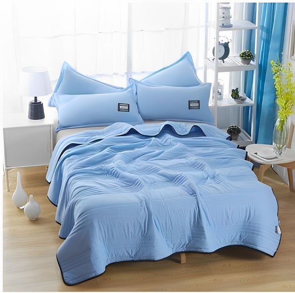 Cooling summer blanket with airy fabric construction