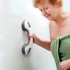 Bathroom safety grab handle with suction cup