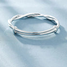 Bracelet in twisted sterling silver with geometric design