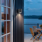 Outdoor wall light fixture with up down lighting
